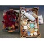 Two boxes of assorted china and glassware including red glasses, pottery jugs and vases, figures,