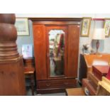 An Edwardian mirrored door wardrobe with under drawer. 201cm x 128cm x 49cm