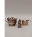 A Georgian silver mustard pot, a later example and a pepperette (3)