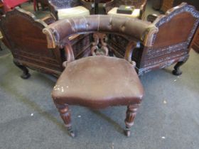 A 19th Century possibly William IV captain's chair with leatherette upholstery, melon fluted front