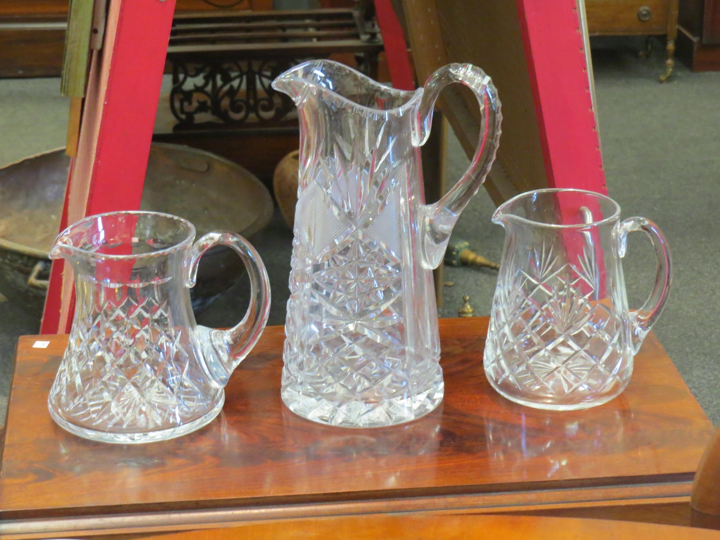 Three crystal jugs