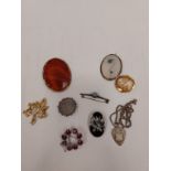 A quantity of bijouterie including marcasite brooches, silver Albert, oval gemstone set brooches,