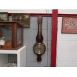 An early 19th Century aneroid barometer/thermometer in a mahogany case, Market Place, Norwich