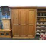 A natural pine triple door "Alexander Furniture" wardrobe, 198cm high x 150cm wide x 54cm deep
