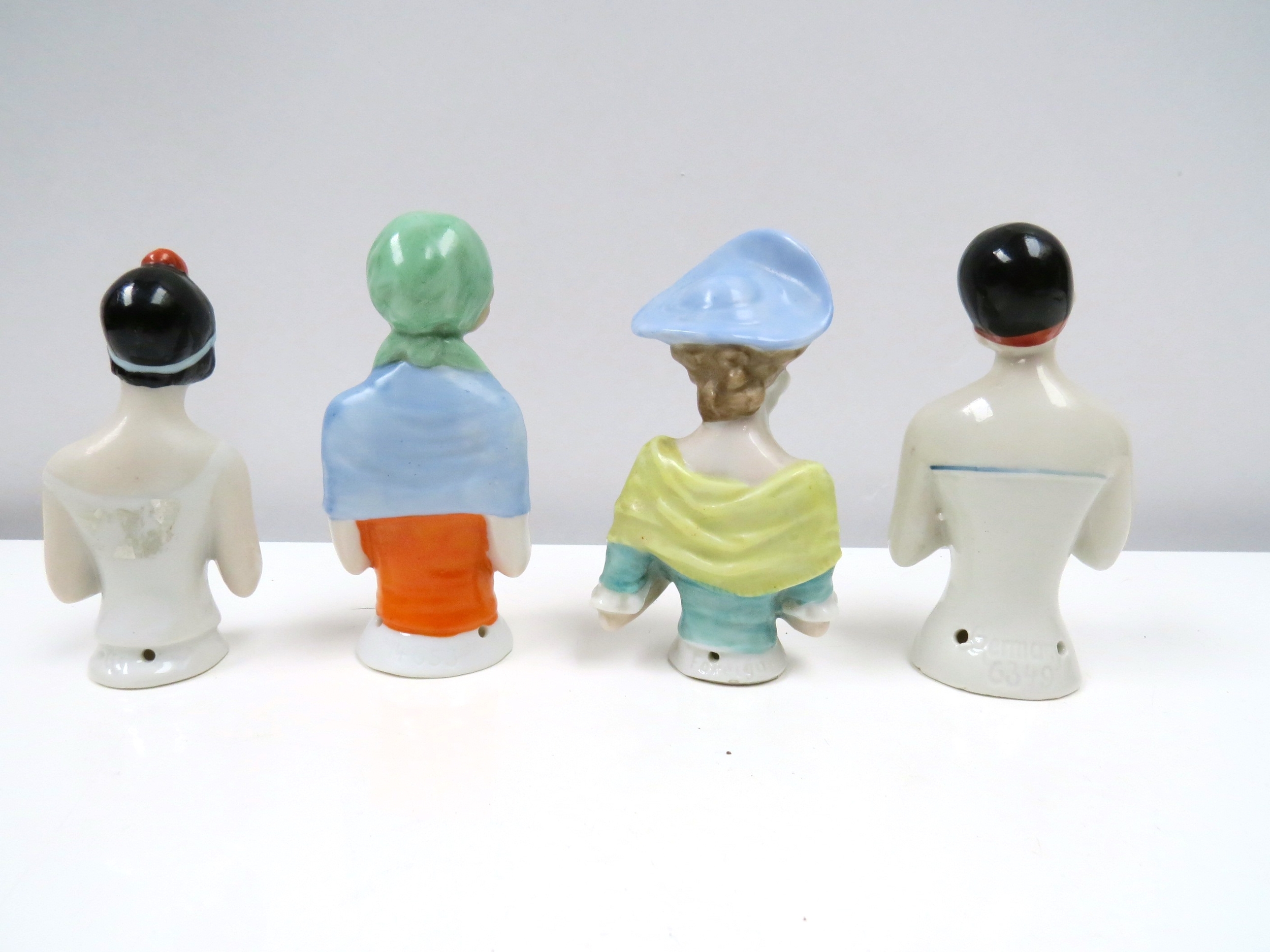 Four early 20th Century glazed china half-dolls including Pierrette, tallest 9cm tall - Image 2 of 2