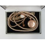 A gold plated fob watch, two faux pearl necklaces, lady's Avia wristwatch etc.