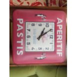 A Roger Lascelles tin wall clock in French style "Aperitif Pastis"