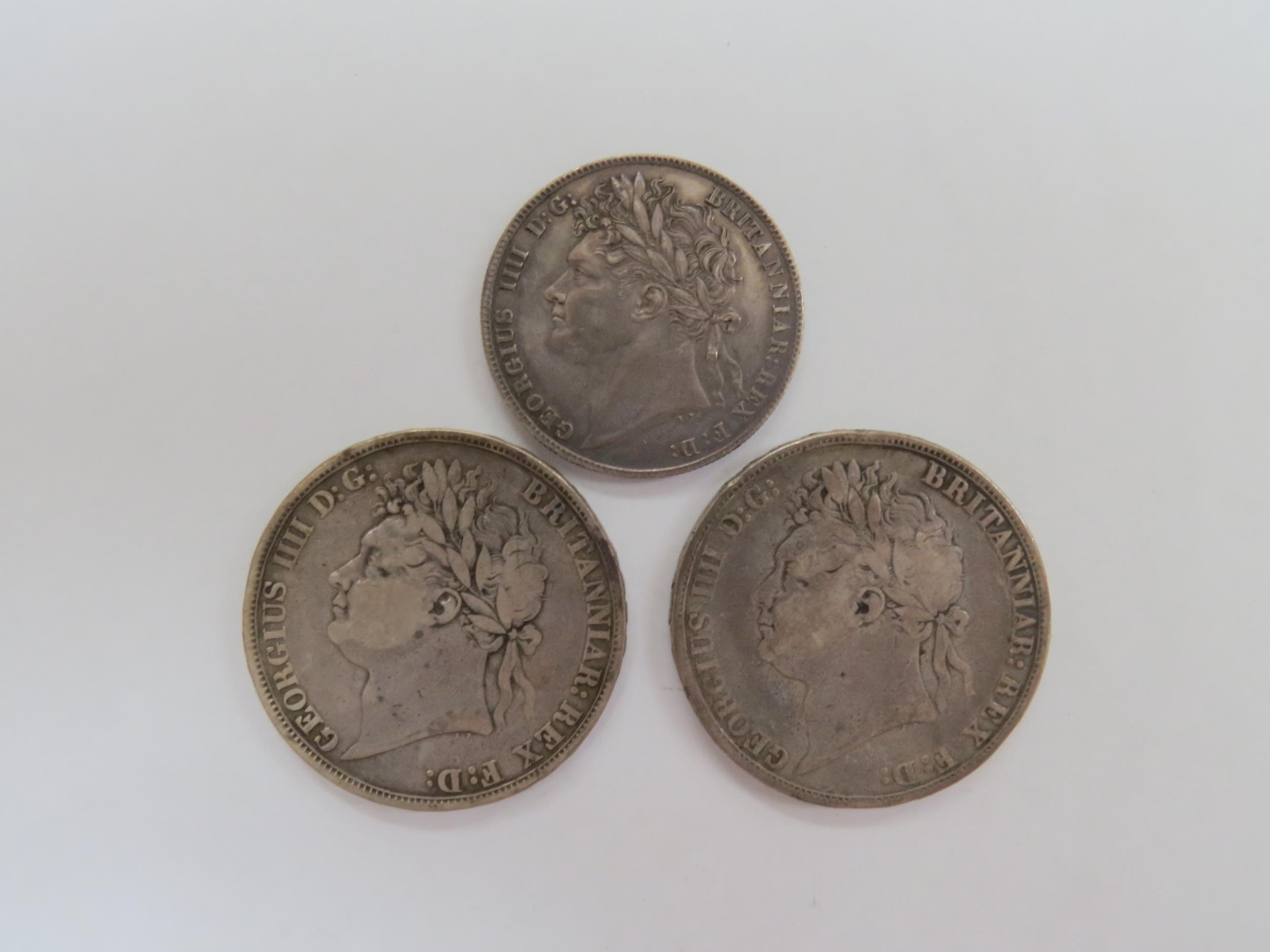 George IV (1820-1830): 1821 and 1822 Crowns (both poor) 1821 halfcrown (VF) (3)