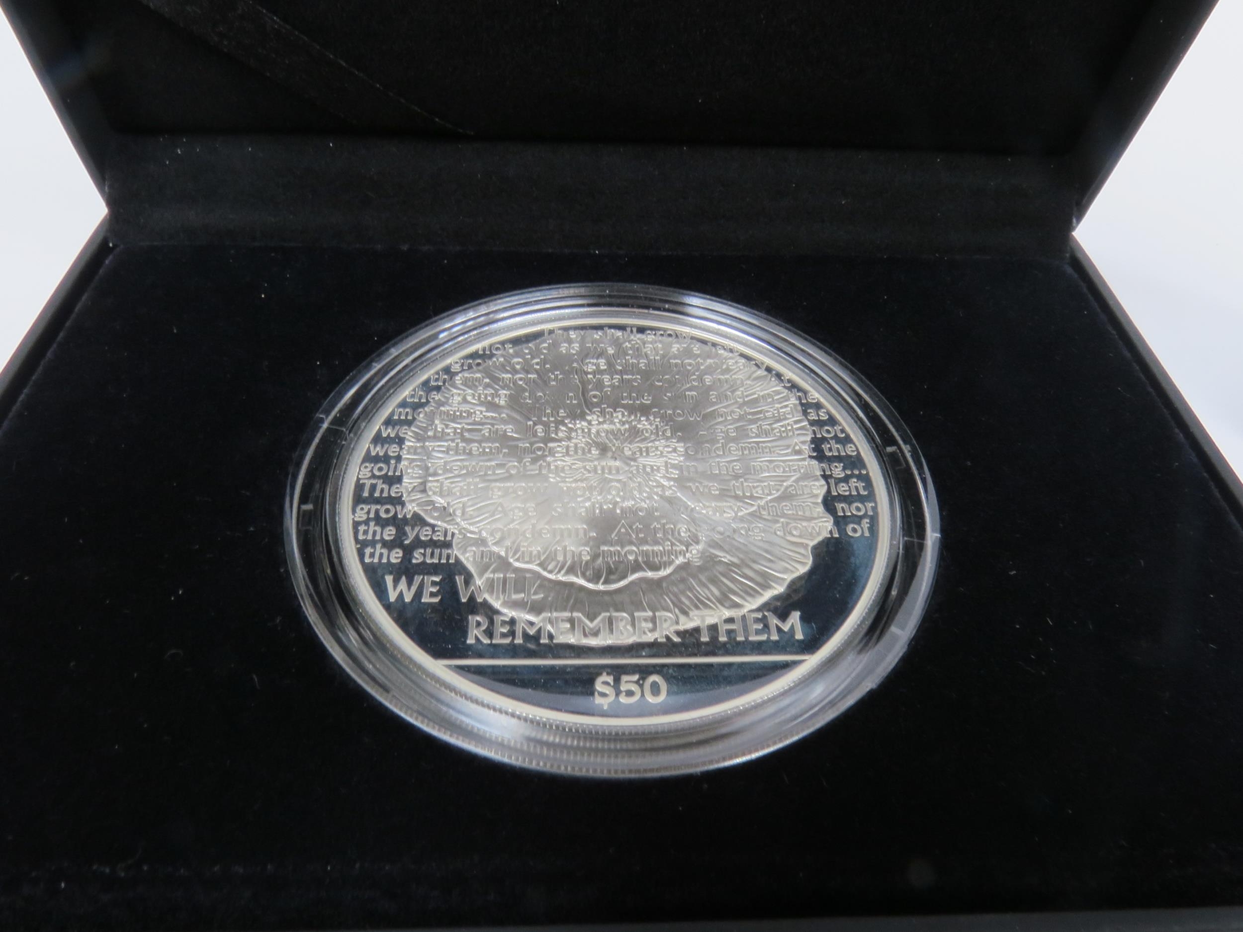 A Royal Mint 2008 Soloman Islands WWI 90th Anniversary 65mm silver proof coin, with certificate - Image 2 of 2