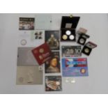 A collection of Royal Mint and other coin packs and sets including Olympic Games related, Royal