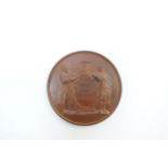 A cased Pharmaceutical Society of Great Britain bronze medal designed by L.C Wyon and awarded to