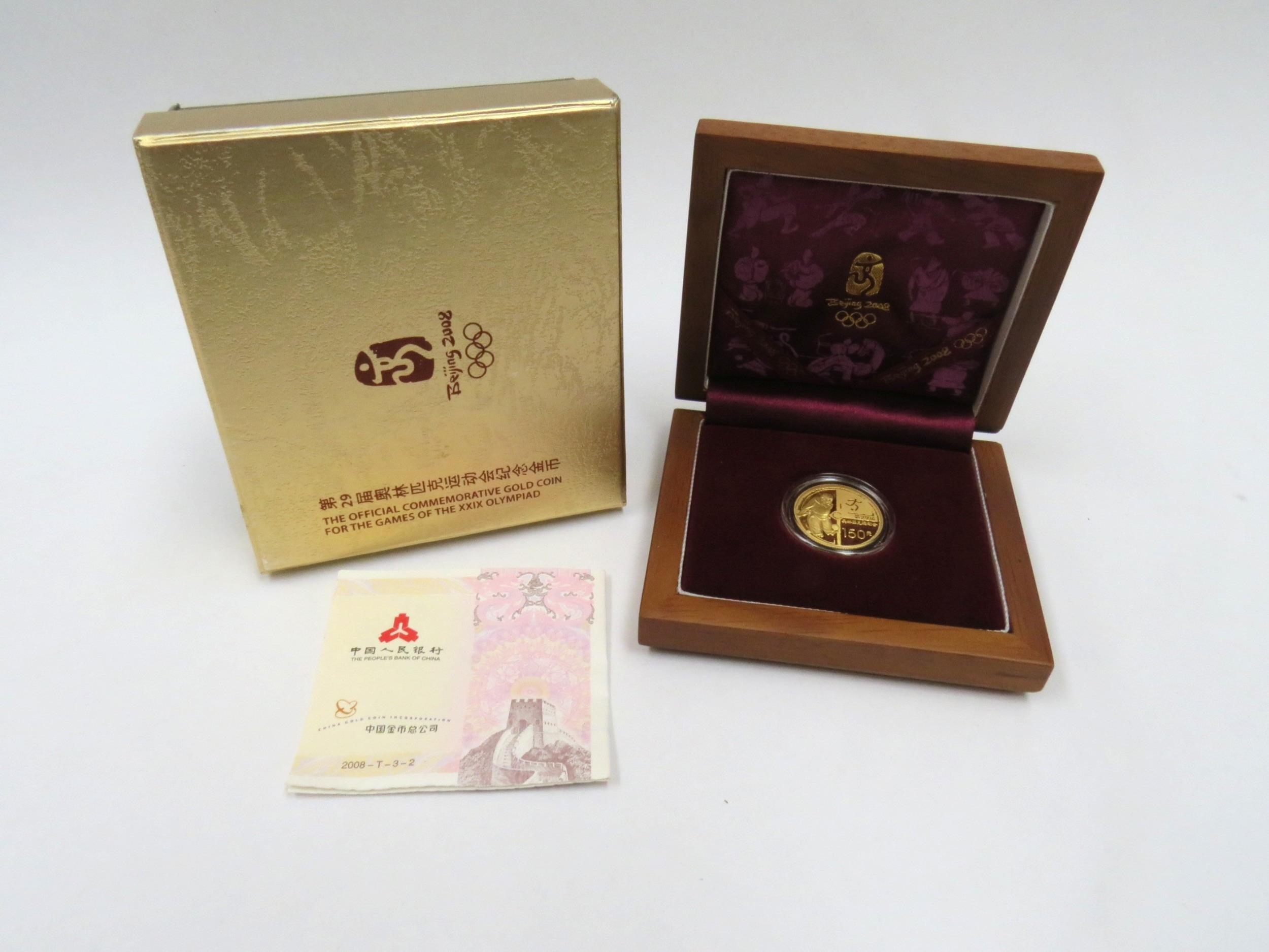 A Beijing 2008 XXIX Olympiad Gold coin, 1/3oz 150 Yuan, with certificate and boxes