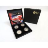 A Royal Mint 2009 50th Anniversary of the Mini £5 four coin silver proof set with certificate and