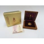 A Beijing 2008 XXIX Olympiad Gold coin, 1/3oz 150 Yuan, with certificate and boxes