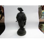 A cast metal figure of a scholar, 52cm tall