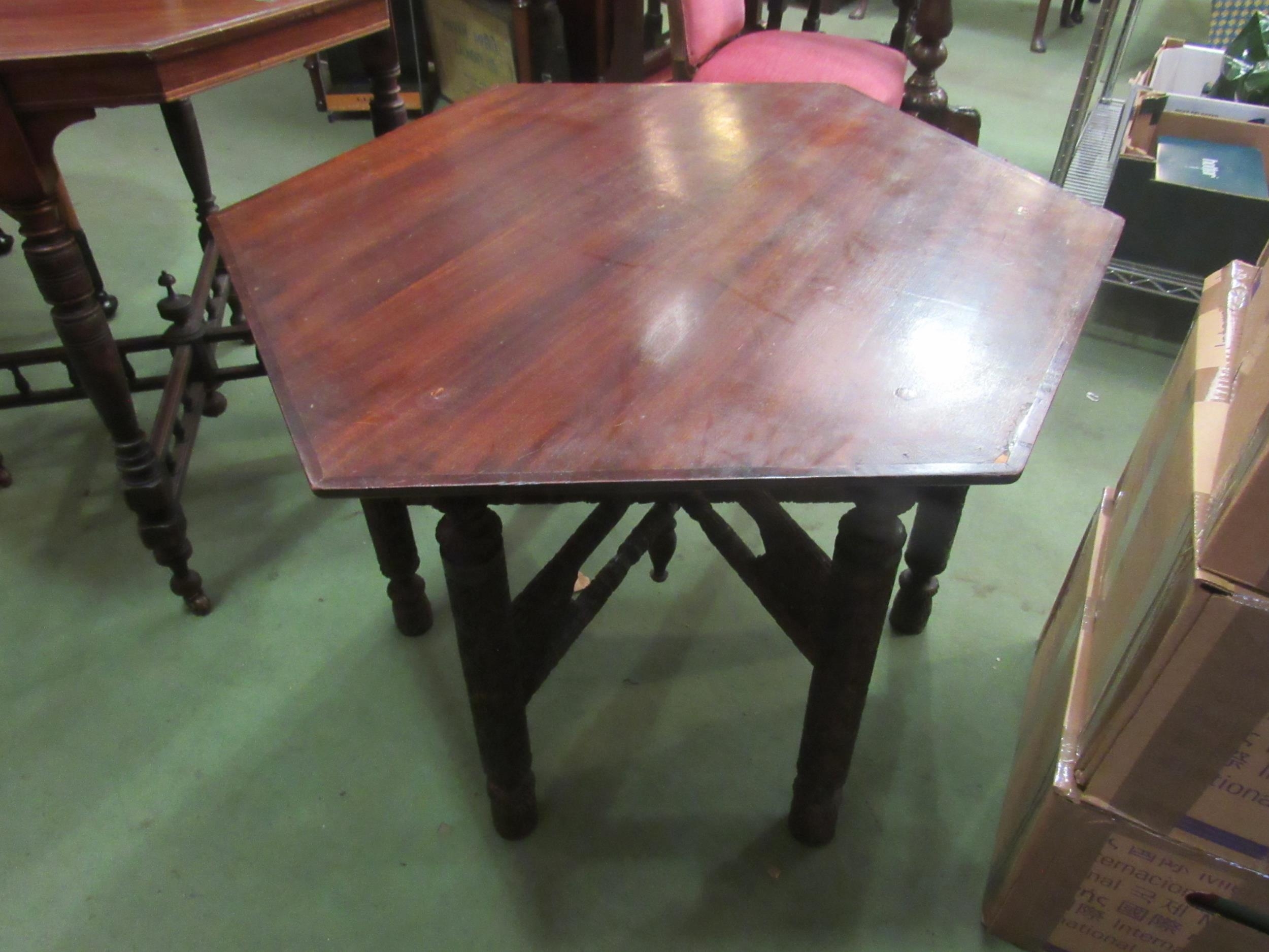 A circa 1900 Indian hexagonal occasional table with carved base, later top, 72cm diameter