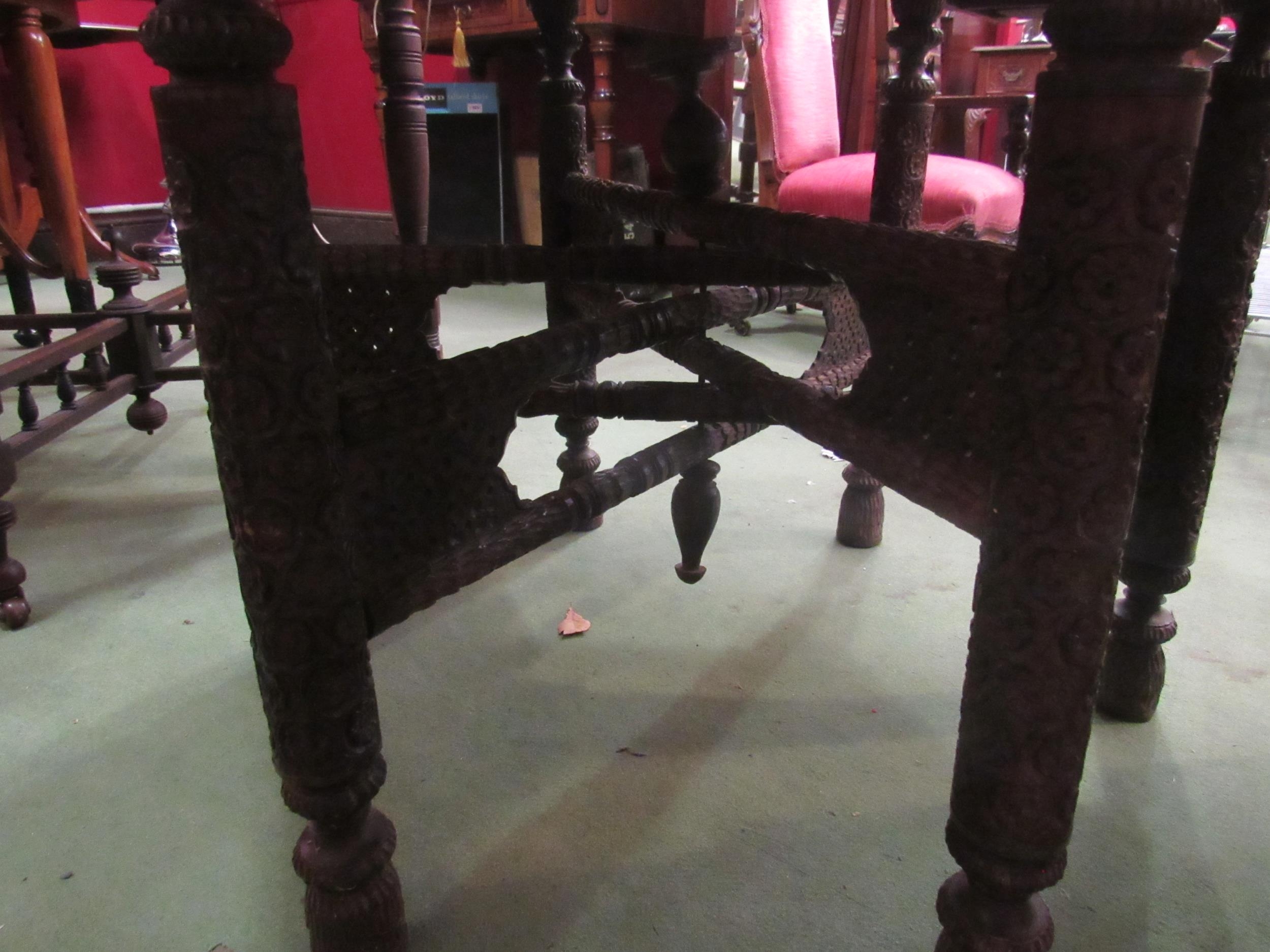 A circa 1900 Indian hexagonal occasional table with carved base, later top, 72cm diameter - Image 2 of 3