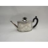 An oval Victorian silver batchelor's tea pot London 1868 maker George Fox