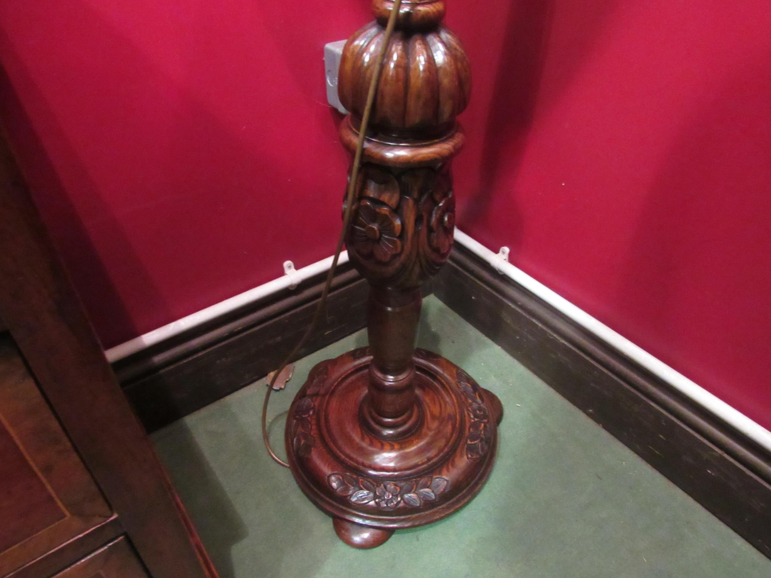 An oak standard lamp with shade the turned column with fluted and carved Tudor Rose decoration on - Image 2 of 5