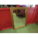 A bevel edged gilt frame mirror, 108cm x 77cm