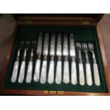A Mappin & Webb fruit set, mother-of-pearl handles, mahogany fitted case