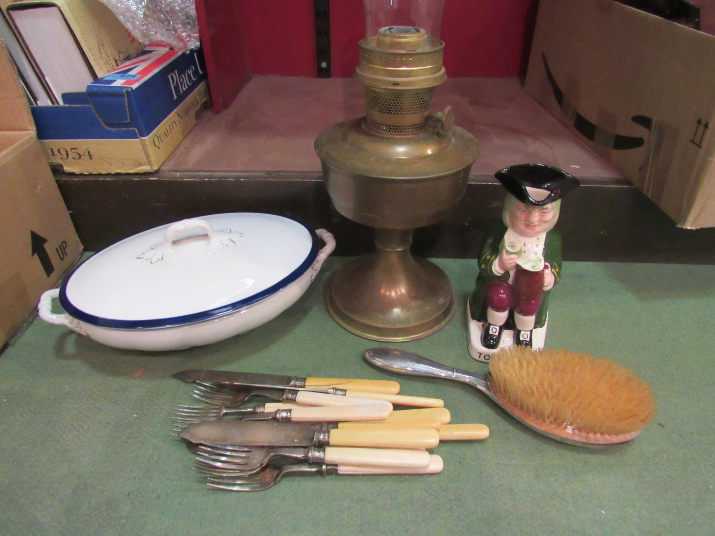 A mixed lot including plated fish knives and forks, Wade Toby jug, silver brush, Meakin tureen and