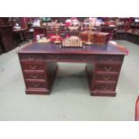A 19th Century mahogany twin pedestal partner's desk the gilt tooled leather insert over twelve
