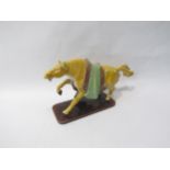 A Chinese "Tang" pottery horse, 16cm high x 29cm wide