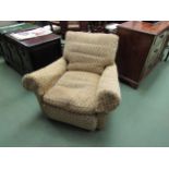 A circa 1950's armchair reputedly by Heal's. Gold fabric with diamond pattern. Fabric worn