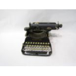 A small scale cased Corona typewriter, case a/f