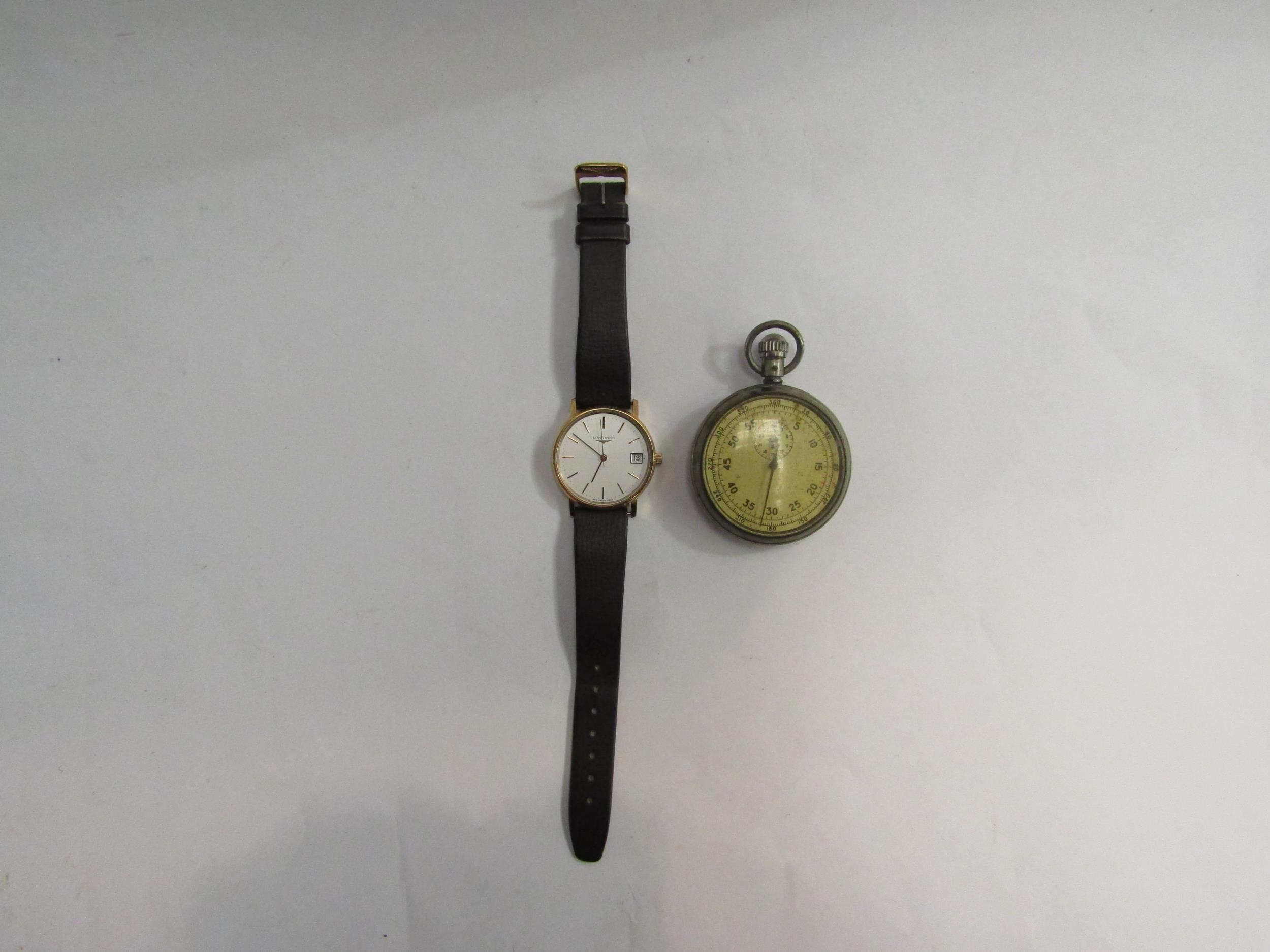 A Longines gent's quartz wristwatch marked 995 Swiss 4903 to face and a stopwatch marked A.M 6B/