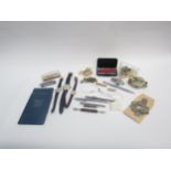 A mixed lot including watches, multitool, Mag-lite, 1874 card calendar fan, decimal coin packs,