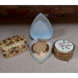 A vintage filigree compact and lipstick holder, a papier mache box and a trinket box on feet (4)