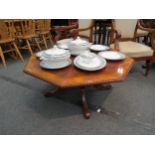 A Victorian style octagonal-top occasional table with ropetwist edge, turned supports to base,