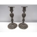 A 19th Century pair of James Kirkby, Gregory & Co. embossed candlesticks with wrythen base,