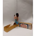 A Pelham puppet of a black girl in original box with instructions