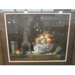 A still-life print depicting a kitchen table with fruit, cup and saucer, etc., framed and glazed