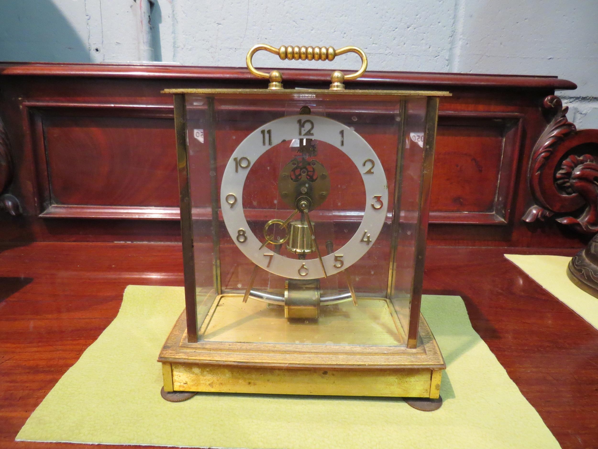A 1960's Kundo electromagnetic Obergfell mantel clock, brass cased