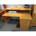 A modern pine desk, three frieze drawers, with shelf gallery back, 88cm high x 130cm wide x 78cm