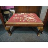 A Victorian stool with tapestry seat scene of birds among foliage, seat worn