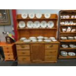 A Victorian pine dresser base with later plate rack, 180cm x 153cm x 57cm