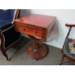 A Victorian drop-leaf writing/sewing table on pillar and circular plinth