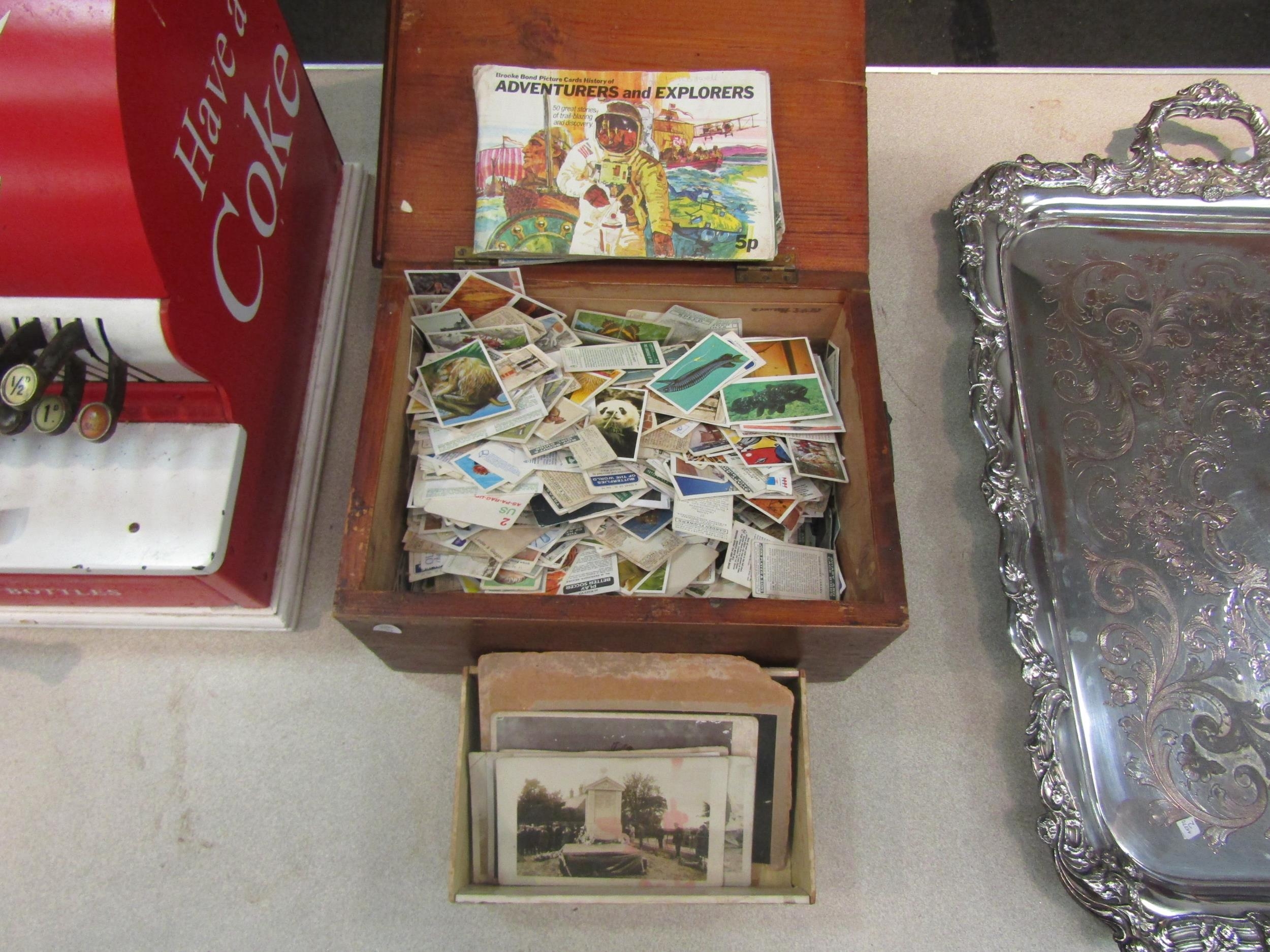 A small chest containing a quantity of cigarette and picture cards including Brooke Bond and Players