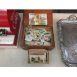 A small chest containing a quantity of cigarette and picture cards including Brooke Bond and Players