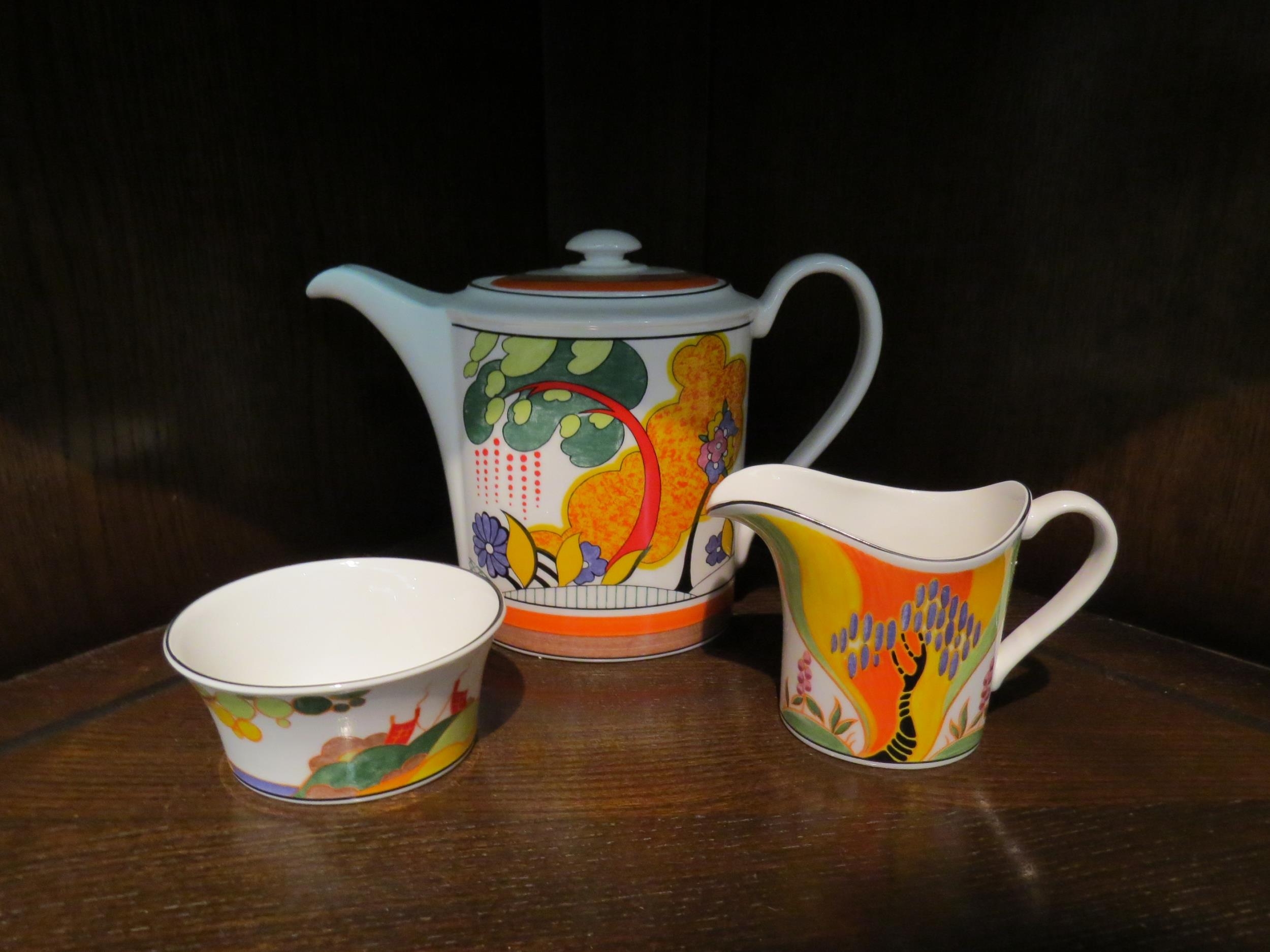 A Wedgwood Clarice Cliff harlequin coffee set consisting of coffee pot, sucrier, milk jug and - Image 3 of 3