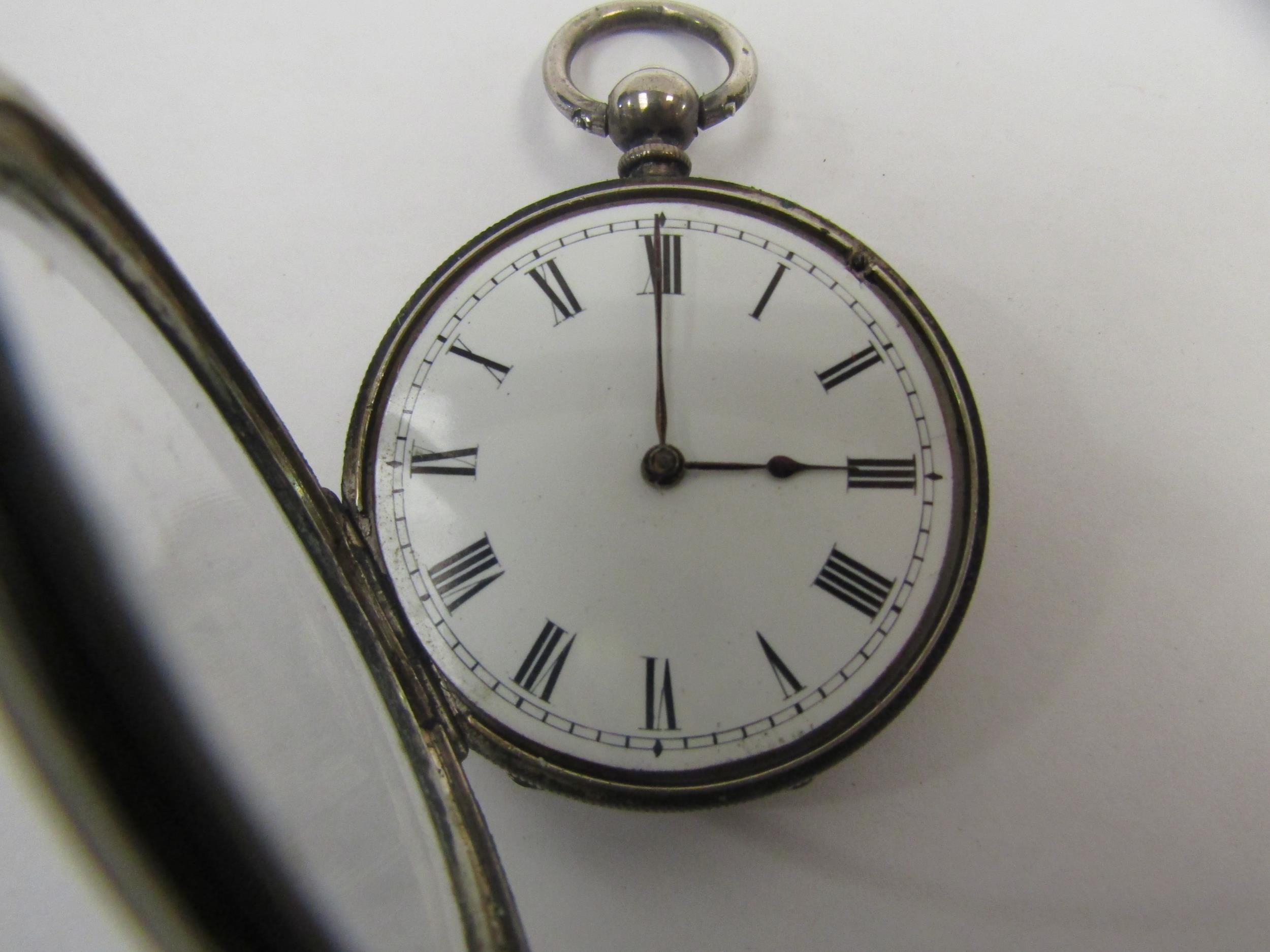 Two pocket watches; one silver example by W.C. Spikins, Upton Park, the other marked 'fine - Image 3 of 3