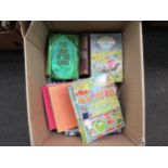 A box of children's and illustrated books, including J.RR Tolkien, Antoine de Saint Exupery,