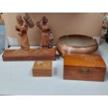 Two carved wooden figures together with wooden boxes including a stamp box and a plated copper