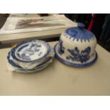 A transferware blue and white 'Blakeney' cheese dome together with a collection of willow pattern