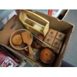 A box of treen including small chest of drawers, lidded pots and bowl